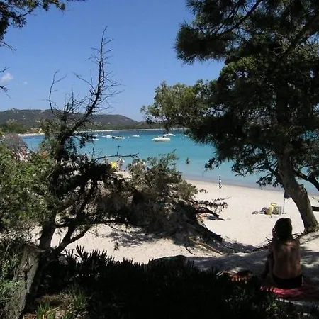 Face A La Grande Plage De Cala Rossa Lecci